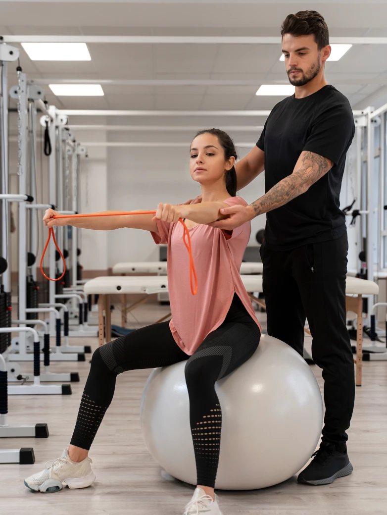 A patient happily achieving maximum results from physiotherapy without medication or surgery.